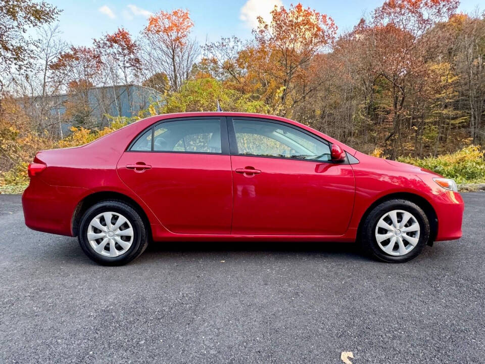 2011 Toyota Corolla for sale at X-Pro Motors in Fitchburg, MA