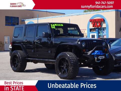 2011 Jeep Wrangler Unlimited for sale at Sunny Florida Cars in Bradenton FL