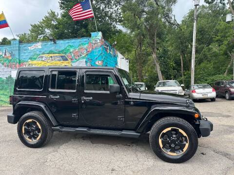 2014 Jeep Wrangler Unlimited for sale at SHOWCASE MOTORS LLC in Pittsburgh PA