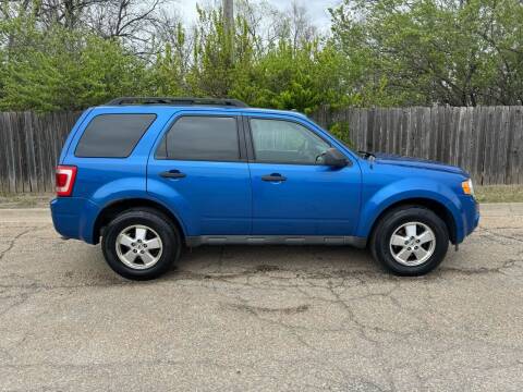 2011 Ford Escape for sale at THELOT AUTO SALES LLC. in Lawrence KS