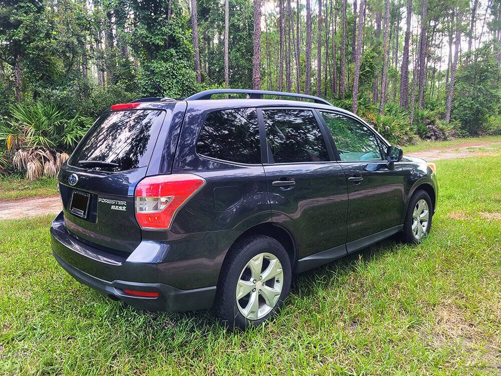 2014 Subaru Forester for sale at Flagler Auto Center in Bunnell, FL