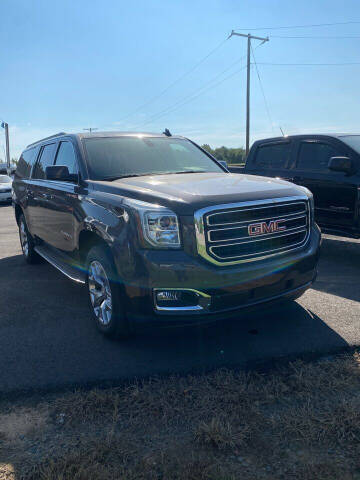 2015 GMC Yukon XL for sale at BEST AUTO SALES in Russellville AR