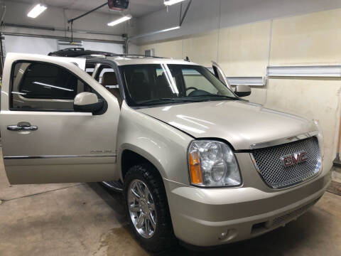 2013 GMC Yukon for sale at MADDEN MOTORS INC in Peru IN