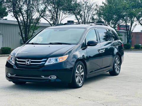 2015 Honda Odyssey for sale at Triple A's Motors in Greensboro NC