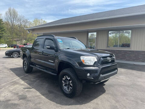 2012 Toyota Tacoma for sale at RPM Auto Sales in Mogadore OH
