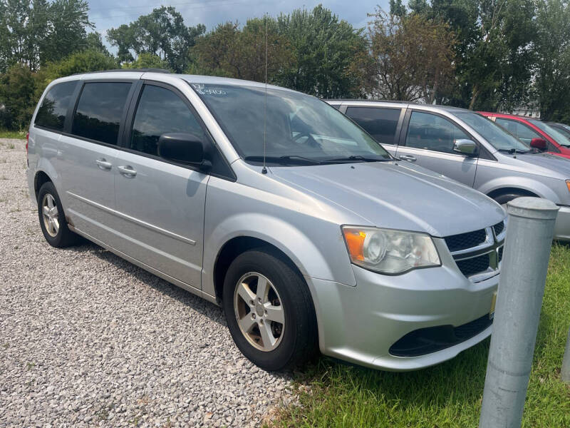 2012 Dodge Grand Caravan for sale at HEDGES USED CARS in Carleton MI