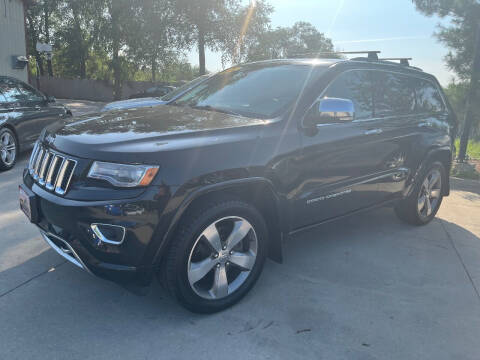 2014 Jeep Grand Cherokee for sale at Azteca Auto Sales LLC in Des Moines IA