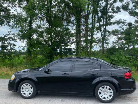 2012 Dodge Avenger for sale at RAYBURN MOTORS in Murray KY