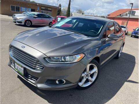 2014 Ford Fusion for sale at MADERA CAR CONNECTION in Madera CA