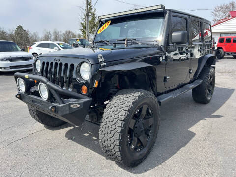 2012 Jeep Wrangler Unlimited for sale at Spooner Auto Sales in Davison MI