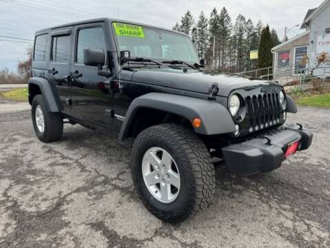 2014 Jeep Wrangler Unlimited for sale at FUSION AUTO SALES in Spencerport NY