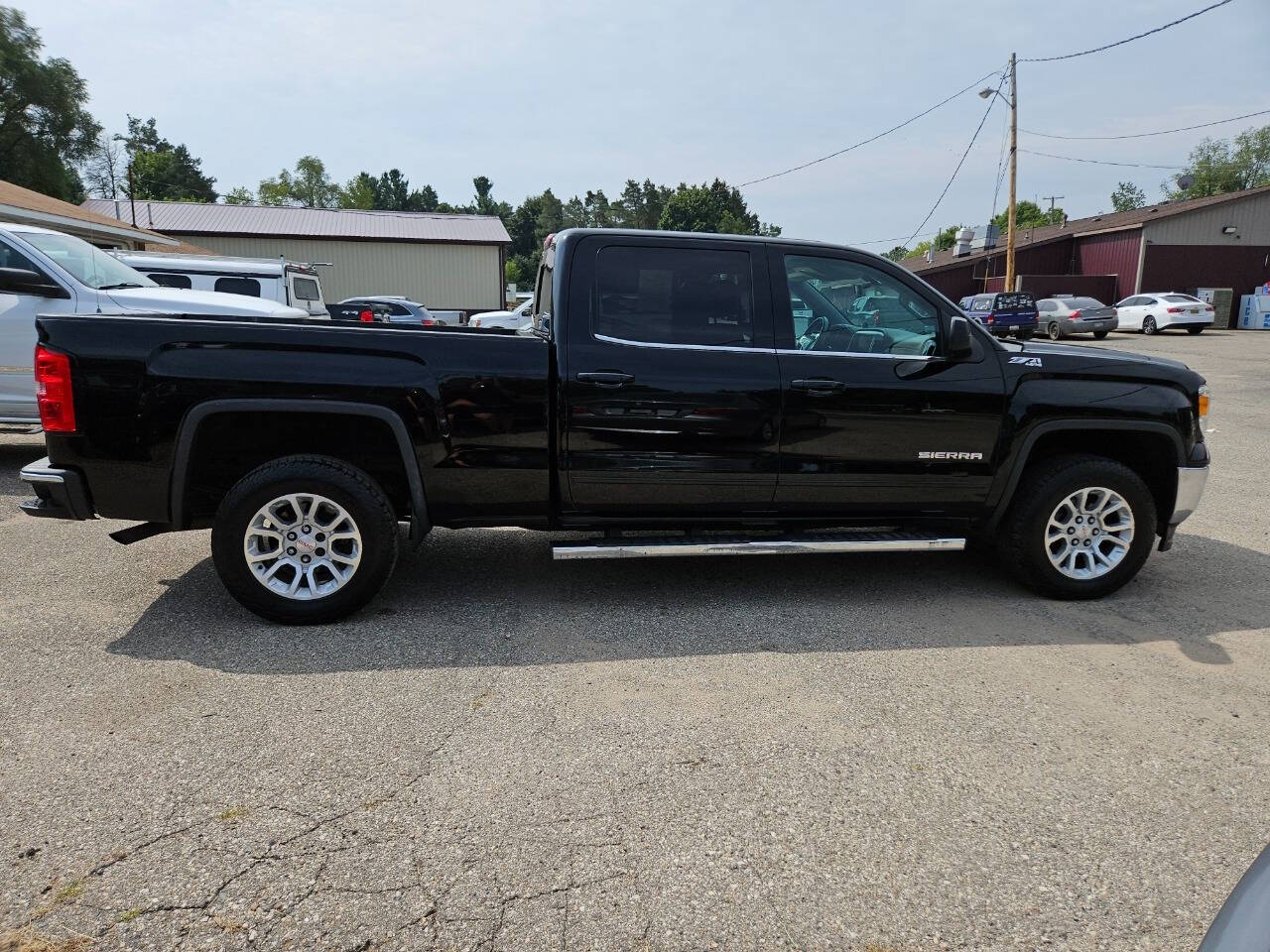 2015 GMC Sierra 1500 for sale at DANGO AUTO SALES in HOWARD CITY, MI