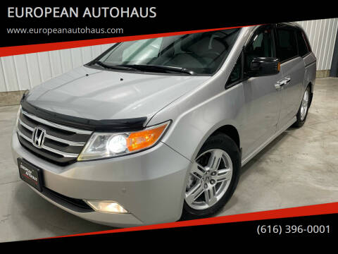 2012 Honda Odyssey for sale at EUROPEAN AUTOHAUS in Holland MI