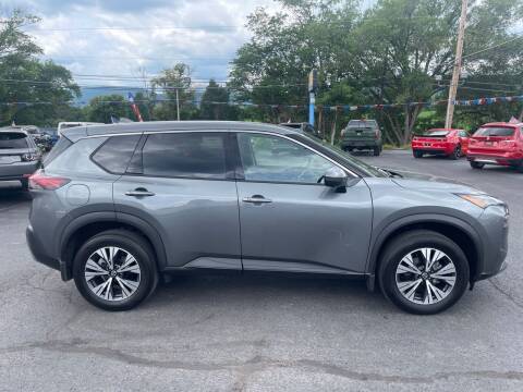 2021 Nissan Rogue for sale at MAGNUM MOTORS in Reedsville PA