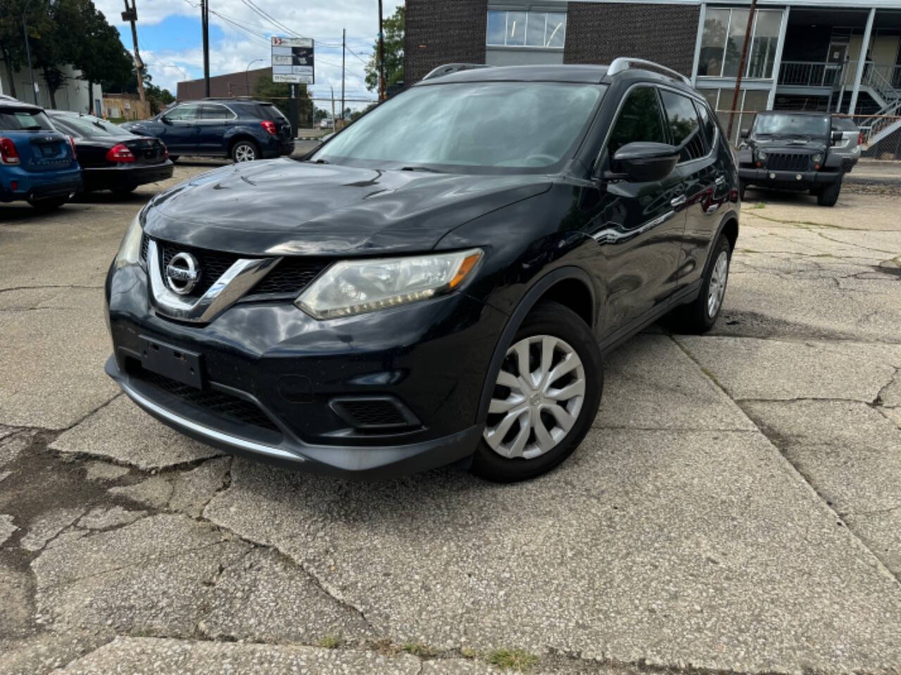 2015 Nissan Rogue for sale at First Class Auto Mall in Akron, OH