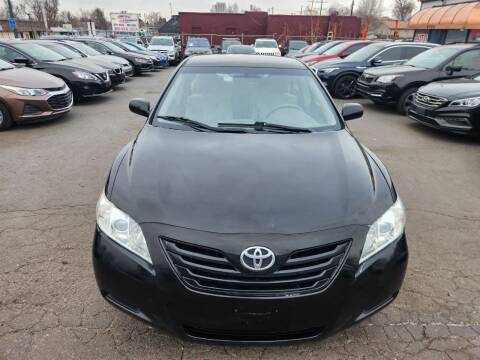 2009 Toyota Camry for sale at SANAA AUTO SALES LLC in Englewood CO