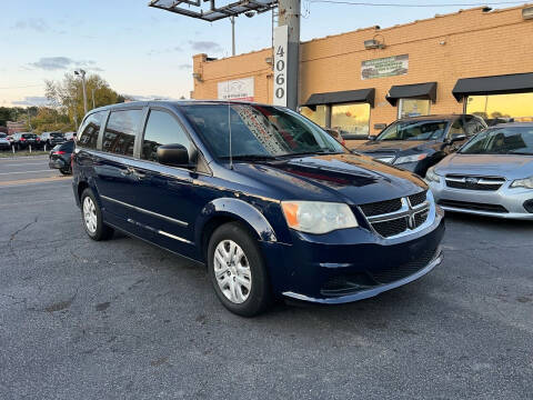 2014 Dodge Grand Caravan for sale at Gem Motors in Saint Louis MO