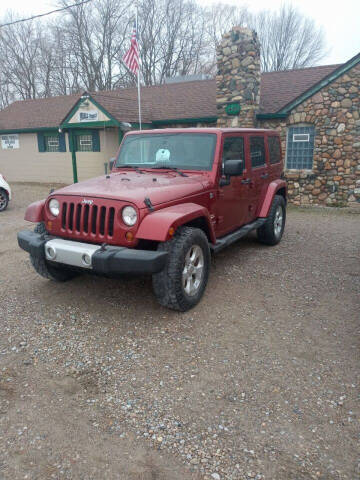 2012 Jeep Wrangler Unlimited for sale at Mobile-tronics Auto Sales in Avoca MI