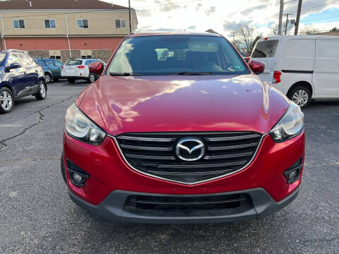 2016 Mazda CX-5 for sale at M & J Auto Sales in Attleboro MA