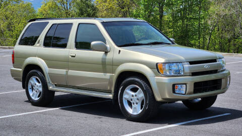 2002 Infiniti QX4 for sale at Rare Exotic Vehicles in Asheville NC