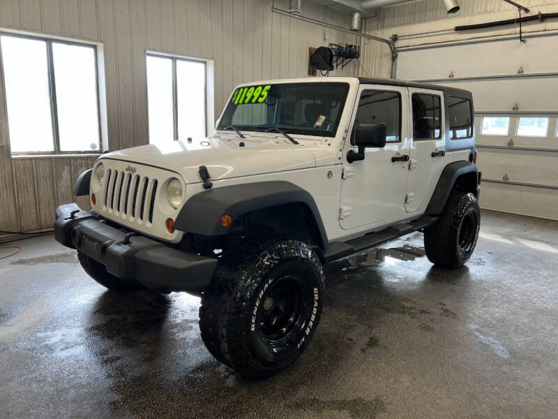 2012 Jeep Wrangler Unlimited for sale at Sand's Auto Sales in Cambridge MN