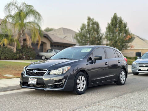 2015 Subaru Impreza for sale at BARMAN AUTO INC in Bakersfield CA