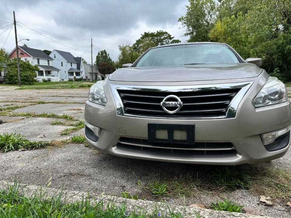 2015 Nissan Altima for sale at SRL SAHER in Lorain, OH