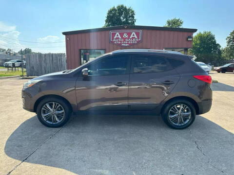 2015 Hyundai Tucson for sale at A & A Auto Sales in Fayetteville AR