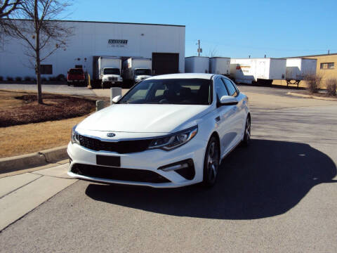 2019 Kia Optima for sale at ARIANA MOTORS INC in Addison IL