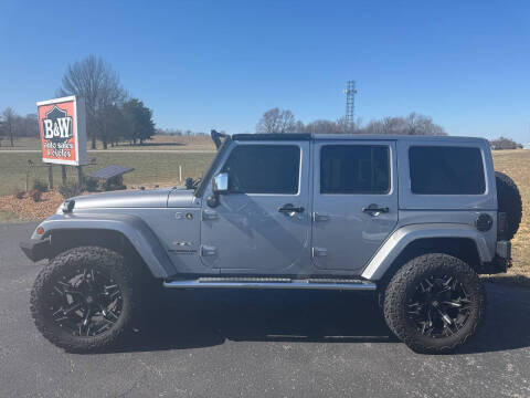2016 Jeep Wrangler Unlimited for sale at B & W Auto in Campbellsville KY