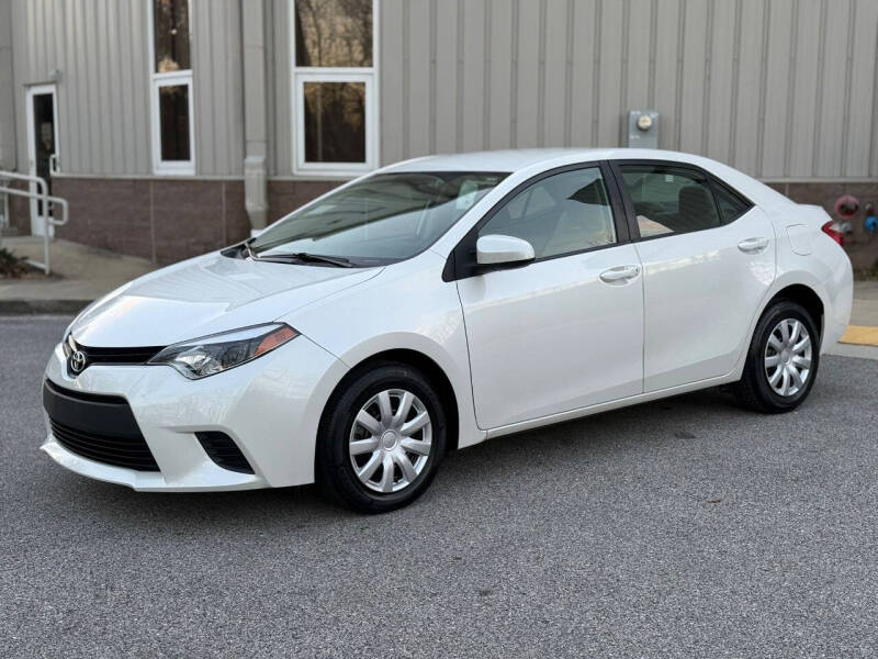 2014 Toyota Corolla for sale at AMERICAR INC in Laurel MD