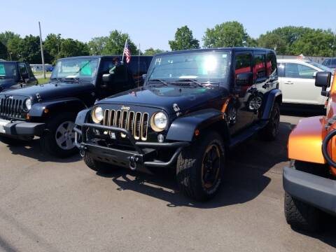 2014 Jeep Wrangler Unlimited for sale at M & H Auto & Truck Sales Inc. in Marion IN