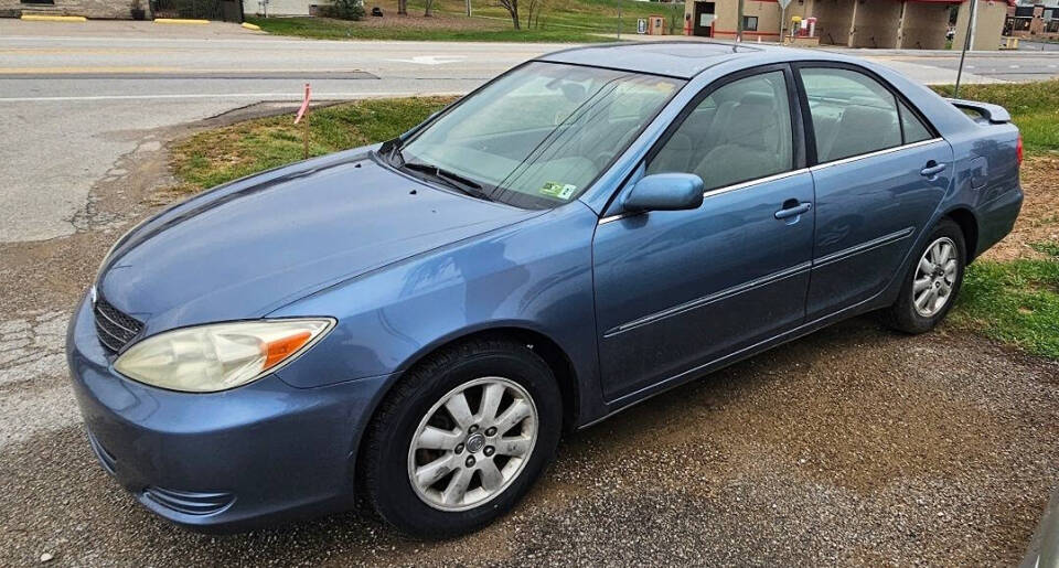 2003 Toyota Camry for sale at Art's Used Cars in Winfield, WV