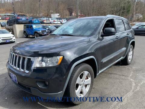 2011 Jeep Grand Cherokee for sale at J & M Automotive in Naugatuck CT