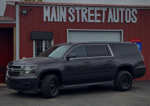 2015 Chevrolet Suburban for sale at Main Street Autos Sales and Service LLC in Whitehouse TX