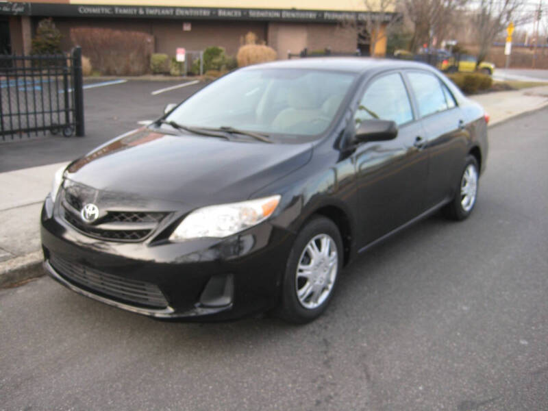 2011 Toyota Corolla for sale at Top Choice Auto Inc in Massapequa Park NY