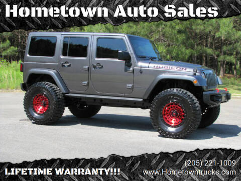 2014 Jeep Wrangler Unlimited for sale at Hometown Auto Sales - SUVS in Jasper AL