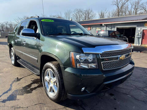 2013 Chevrolet Avalanche for sale at Newcombs Auto Sales in Auburn Hills MI