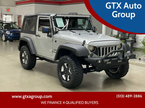2012 Jeep Wrangler for sale at GTX Auto Group in West Chester OH