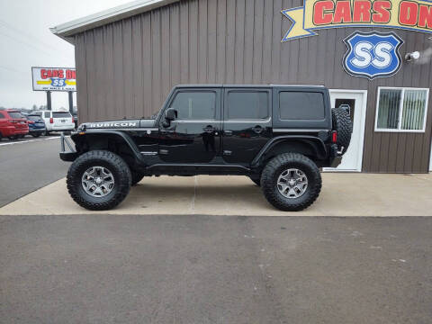 2013 Jeep Wrangler Unlimited for sale at CARS ON SS in Rice Lake WI