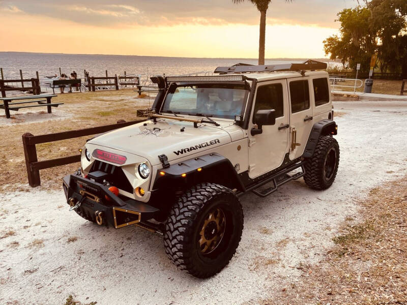 2011 Jeep Wrangler Unlimited for sale at Santana Auto in Altamonte Springs FL