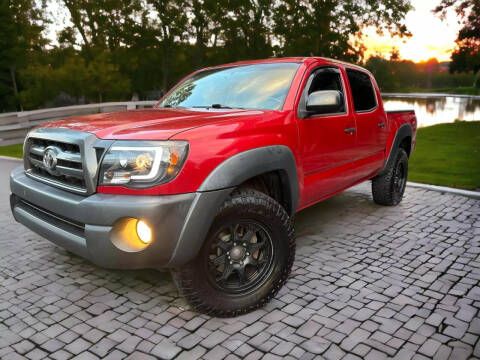 2009 Toyota Tacoma for sale at Carma Auto Group in Duluth GA