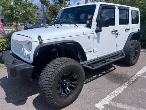 2015 Jeep Wrangler Unlimited for sale at Bay City Autosales in Tampa FL