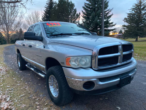 2004 Dodge Ram Pickup 1500 for sale at BELOW BOOK AUTO SALES in Idaho Falls ID
