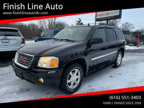2009 GMC Envoy for sale at Finish Line Auto in Comstock Park MI