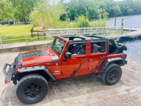 2014 Jeep Wrangler Unlimited for sale at Santana Auto in Altamonte Springs FL