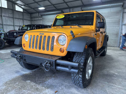 2013 Jeep Wrangler Unlimited for sale at Walker Family Automotive in Albertville AL