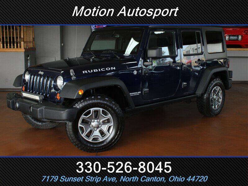 2013 Jeep Wrangler Unlimited for sale at Motion Auto Sport in North Canton OH