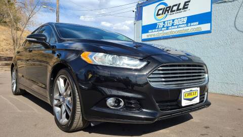 2014 Ford Fusion for sale at Circle Auto Center Inc. in Colorado Springs CO