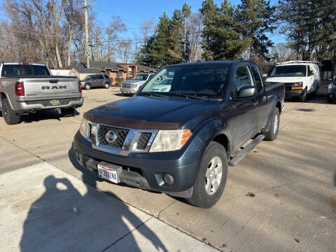 2013 Nissan Frontier for sale at Decisive Auto Sales in Shelby Township MI